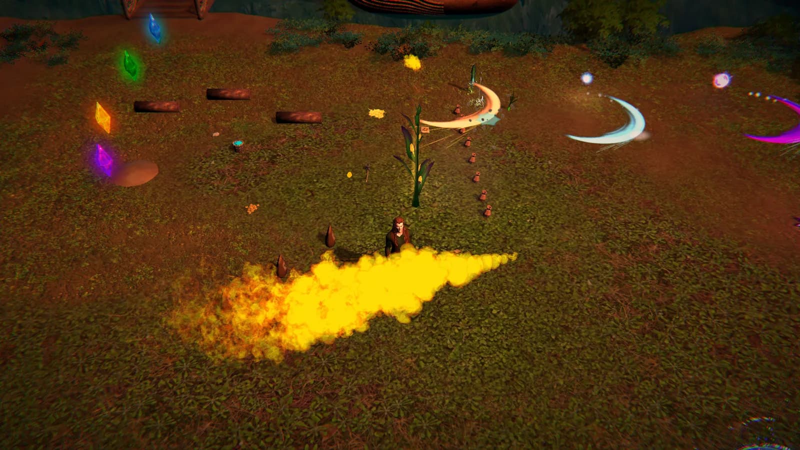 A player character stands in a grass clearing, with a wide stream of yellow fire spread across the ground beside them. Crescent-shaped slash effects in orange, pale blue and magenta hang in the air, and glowing blue, green, yellow and purple crystals float along the left edge.
